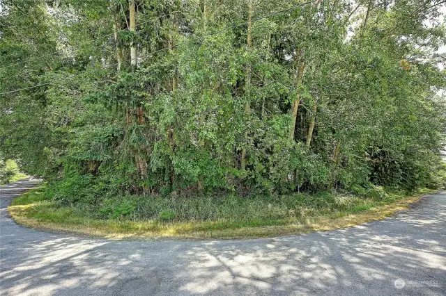 Puget Dr. on the left, Rocky Way to the right. Driveway and gate just a short distance from corner on Rocky Way.