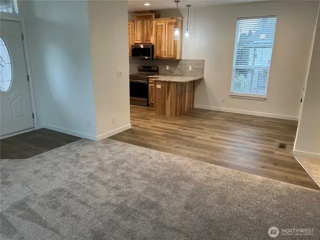 View of dining room and kitchen from living room.