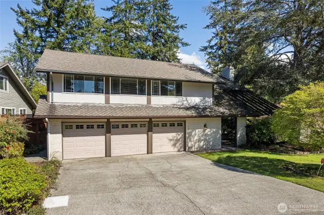 Plenty of parking with three garages and off street parking.