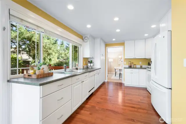 Kitchen with entry to dining room at the back.