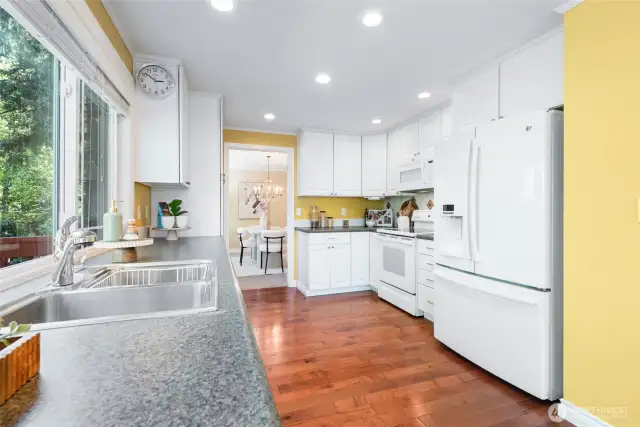 Kitchen with entry to dining room at the back.