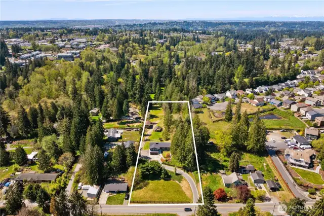 Welcome to this beautiful home located on 2.4 acres of subdividable property zoned R6!