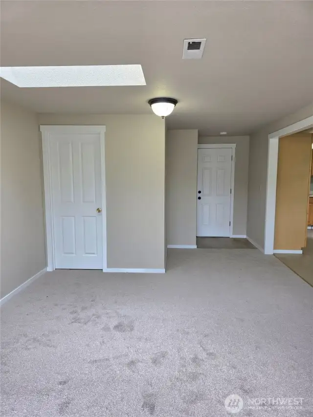 View 3 of family room- access to backyard and storage closet