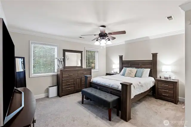 Spacious primary suite has fresh paint.