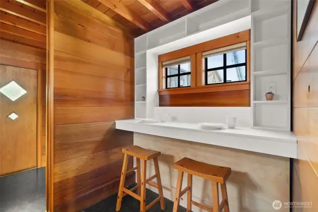 Fold out bed under stools.