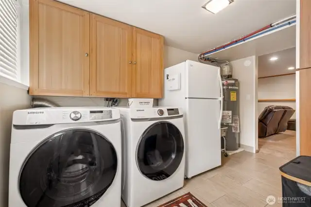 Great storage in the lower level laundry room! W&D stay PLUS: Extra Refrigerator stays too!