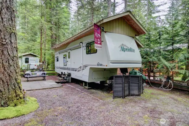 Mature trees surround your new spot!
