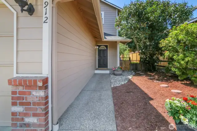 EAST FACING Front door.