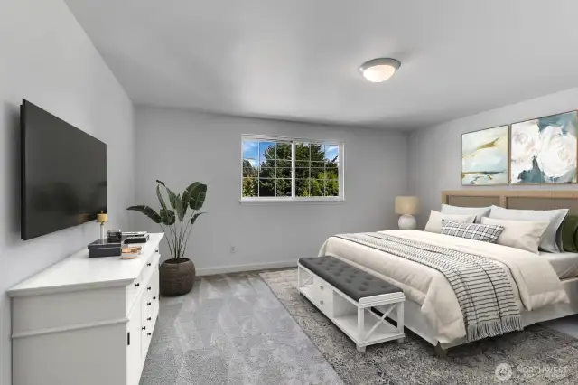 The primary is roomy enough for a king size bed.