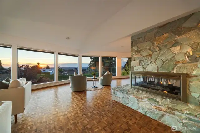 40' of stunning windows frame bay and sunset views