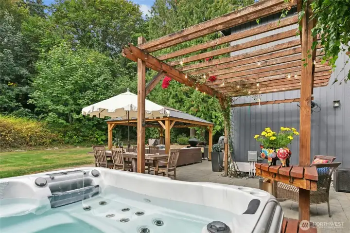 Oversized hot tub with new decking.