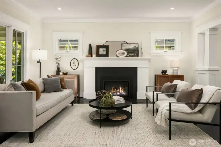Formal living room with gas fireplace.