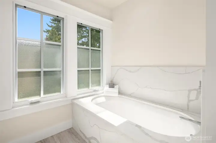 Primary bathroom soaking tub.