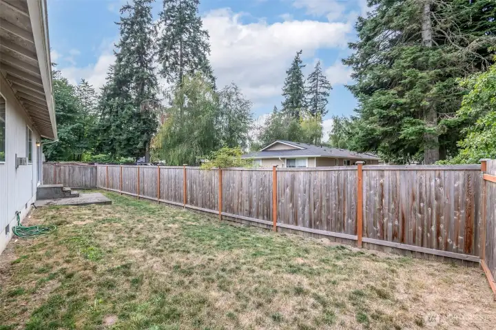 Fully fenced backyard.