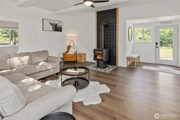 Cozy free-standing wood stove creates a warm atmosphere.