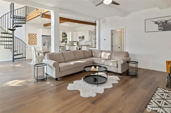 Spacious living room with updated flooring throughout.