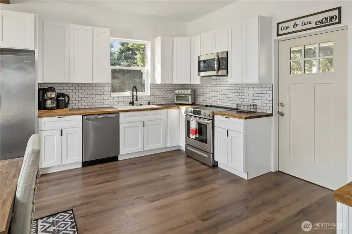 Open kitchen design makes cooking and entertaining easy.