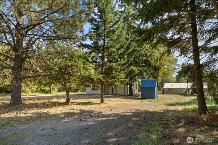 Mature trees add beauty and natural privacy.