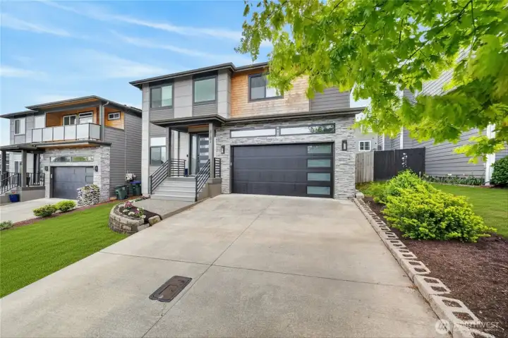 Easy maintenance exterior, with plenty of off-street parking.