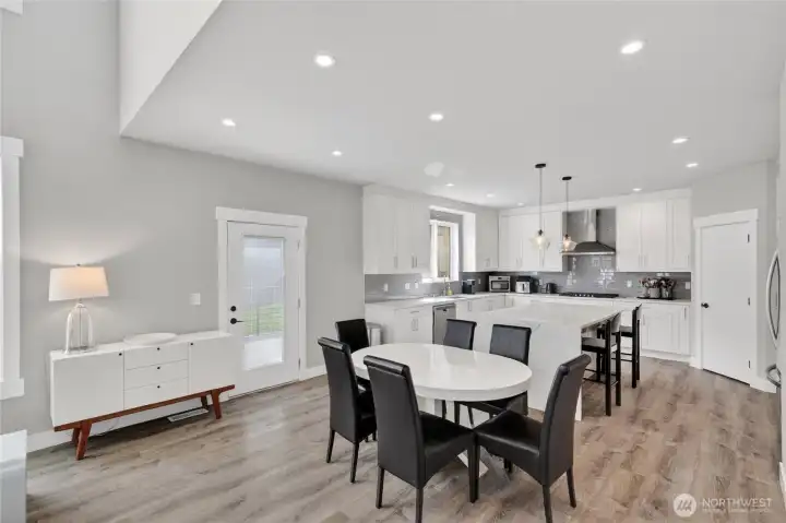 Off the dining area is the door to the over-size back deck.