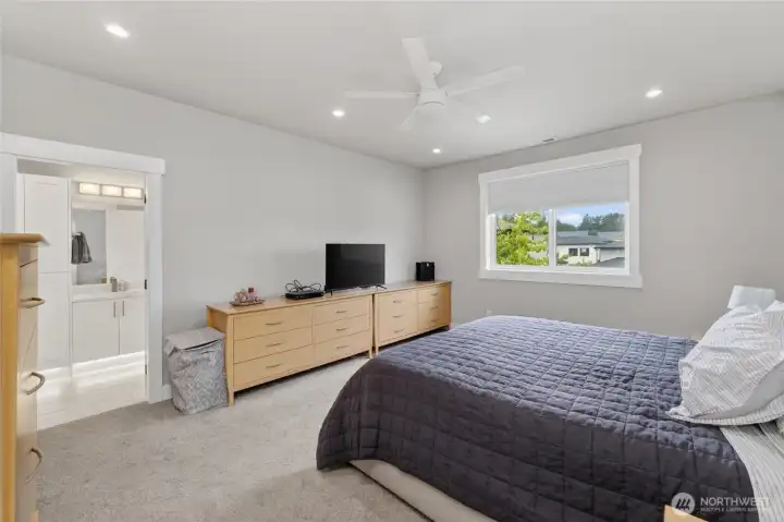 The primary suite is expansive, even with a king-size bed.