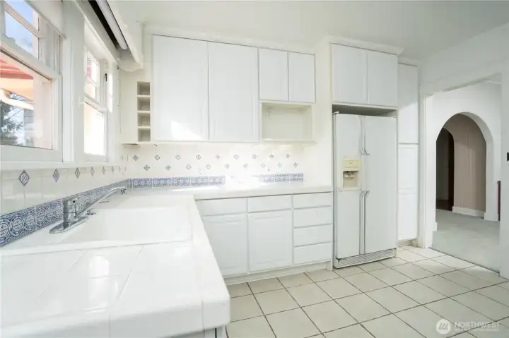 The kitchen is big and has tons of storage.