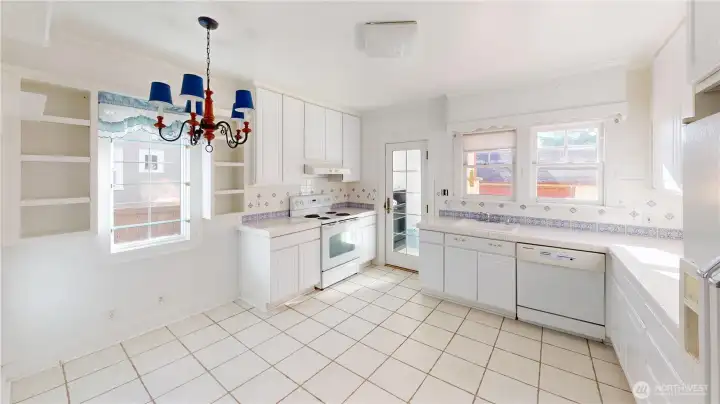 The large eat in kitchen has great bones.  Keep it with informal dining or blow it out and make a chef's dream kitchen- the dining room is adjacent so the op