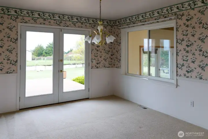 Formal Dining Room with doors to the deck.