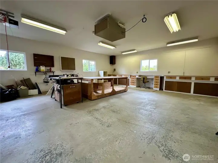 Garage #1 with workspace and storage