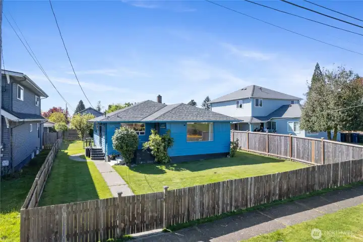 Fully fenced lot with alley access.