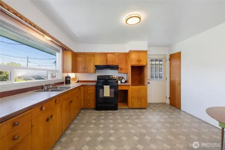 This window in kitchen provides so much light and opens for air flow.