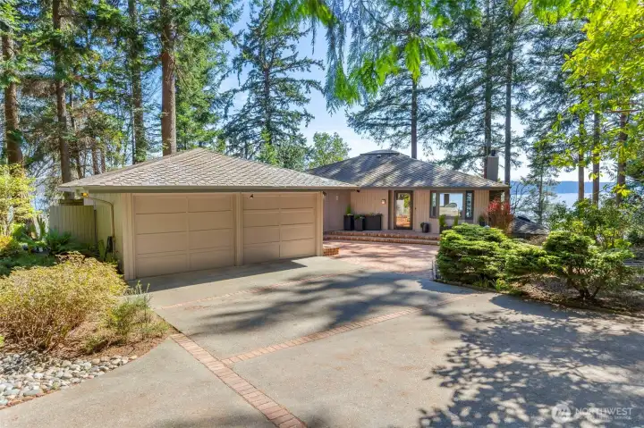 View of home and garage from the circular driveway and water view of Hood Canal View of home and garage from the circular driveway and water view of Hood Canal
