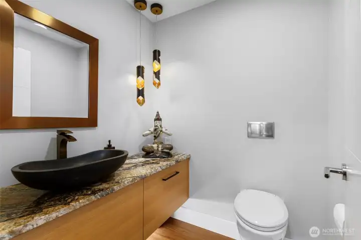 Modern half bath on main floor off living room Modern half bath on main floor off living room