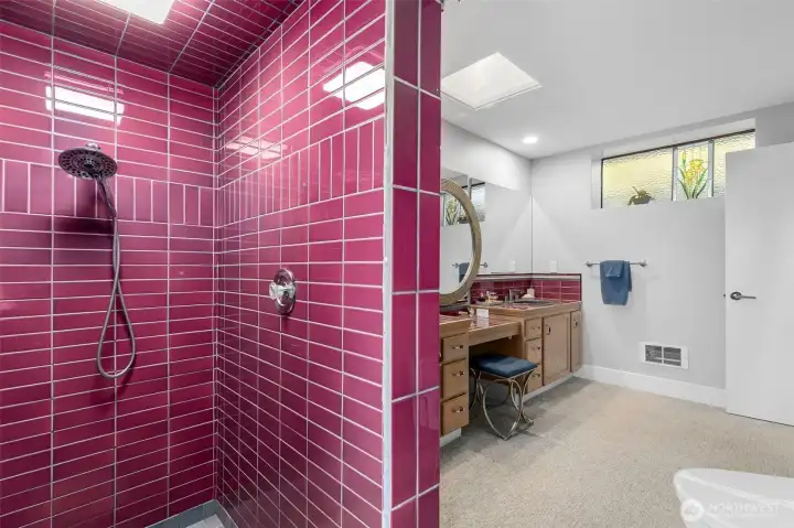 Completely tiled shower with window facing out to the left.. Completely tiled shower with window facing out to the left..