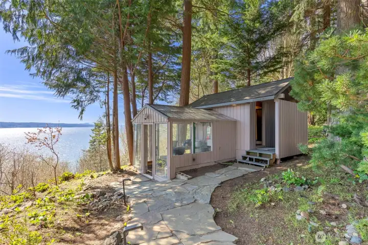 There is plenty of space on this 1.47acre waterfront lot for gardening and here is a greenhouse attached to a super cozy sauna to relieve all your stresses- Soak it up! There is plenty of space on this 1.47acre waterfront lot for gardening and here is a greenhouse attached to a super cozy sauna to relieve all your stresses- Soak it up!