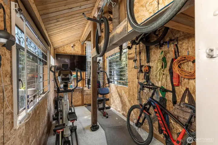 "The work out shed" with TV exercise equipment and storage. "The work out shed" with TV exercise equipment and storage.