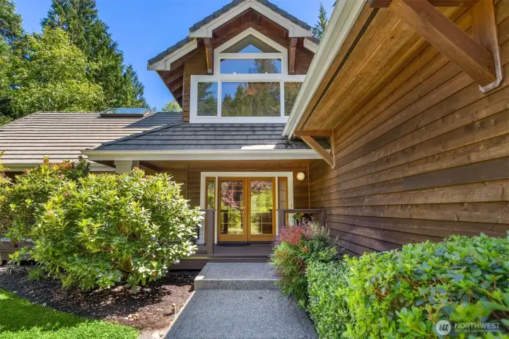 Grand entry with peaked roofline.