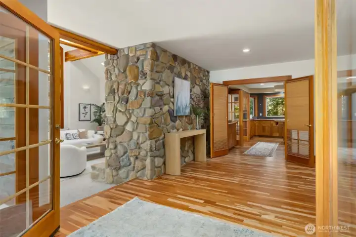 French doors open to the river walk chimney, French doors to the kitchen, cherry hardwoods and tall ceilings.
