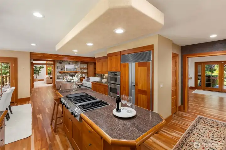 View to the front door on the right and great room/family room on the left.