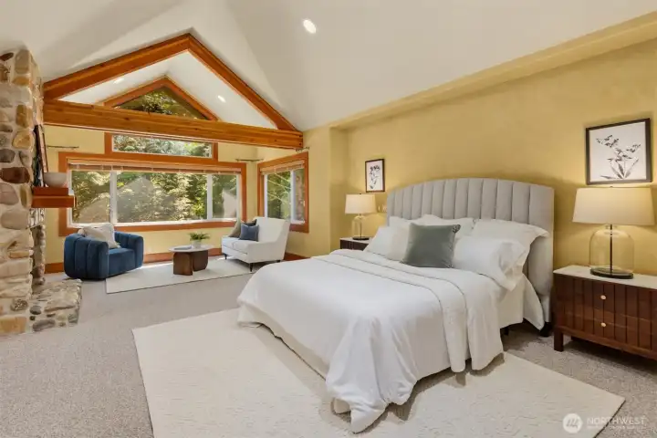 The primary suite with vaulted ceiling.