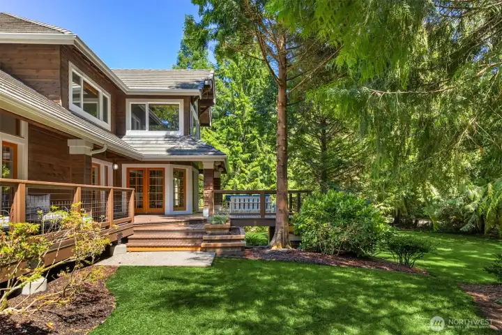 The back deck with expansive lawn to the right.