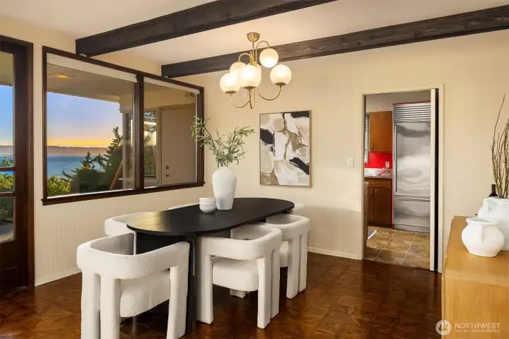 The dining room is adjacent to the kitchen. Engineering plans & renderings are available in the listing highlighting a potential redistribution of the space: opening the kitchen wall into the living area. The dining room is adjacent to the kitchen. Engineering plans & renderings are available in the listing highlighting a potential redistribution of the space: opening the kitchen wall into the living area.