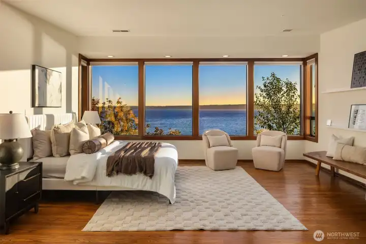 The primary suite, with its fabulous views, is generously sized and private from the other bedrooms. The primary suite, with its fabulous views, is generously sized and private from the other bedrooms.