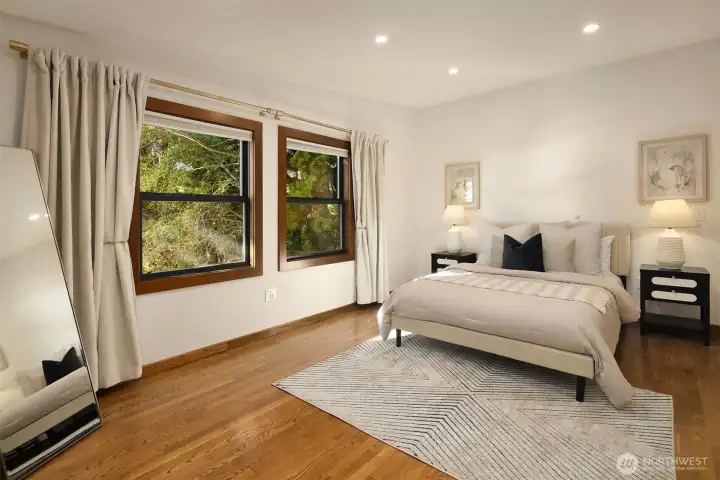 Each bedroom is surprisingly large with high ceilings and enjoys a wall of built-in closets. Each bedroom is surprisingly large with high ceilings and enjoys a wall of built-in closets.