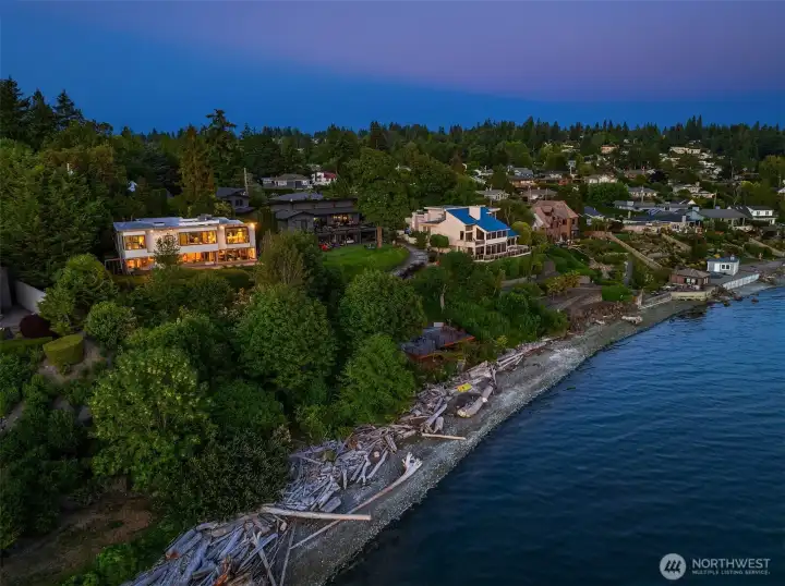 Aerial perspective of the home and its private 90' shoreline at high tide. Aerial perspective of the home and its private 90' shoreline at high tide.