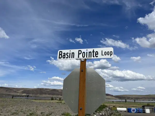 The lot is located on Basin Pointe Loop