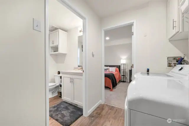 Laundry area off the bathroom and bedroom