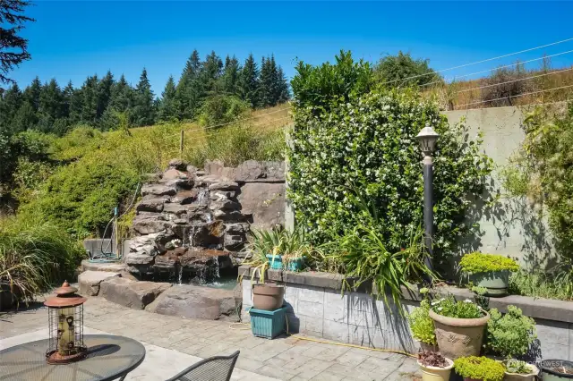 Waterfall on the concrete stamped patio, very private