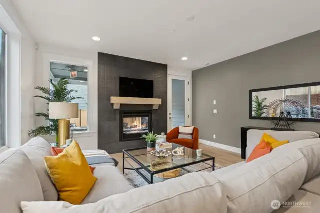 Floor to ceiling tile on the fireplace, and wired for your TV.