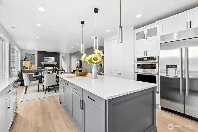 A second wall mounted oven with microwave. Ample storage on both sides of the large island.